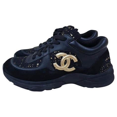 chanel sneakers black and gold